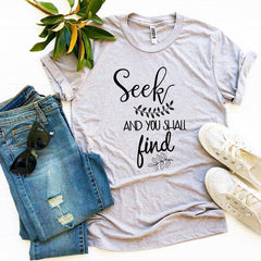 Seek And You Shall Find T-shirt - Faith & Flame - Books and Gifts - Agate -